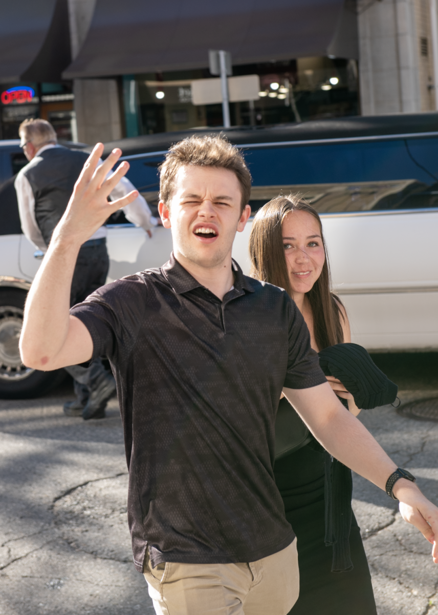 5.7.25 (From L to R) Seniors Cade Schwab and Natalie Newbury walking from the limo to the Babcock Theatre. 
